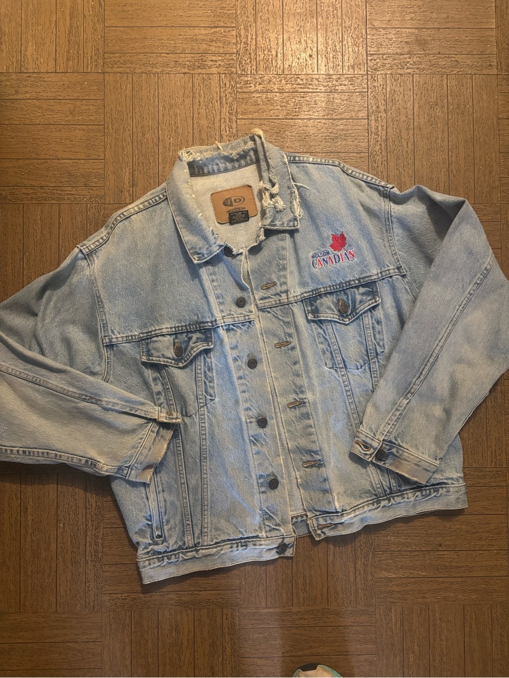 Vintage 1990’s Light Blue Denim Jean Jacket with 'Molson Canadian’ embroidery.